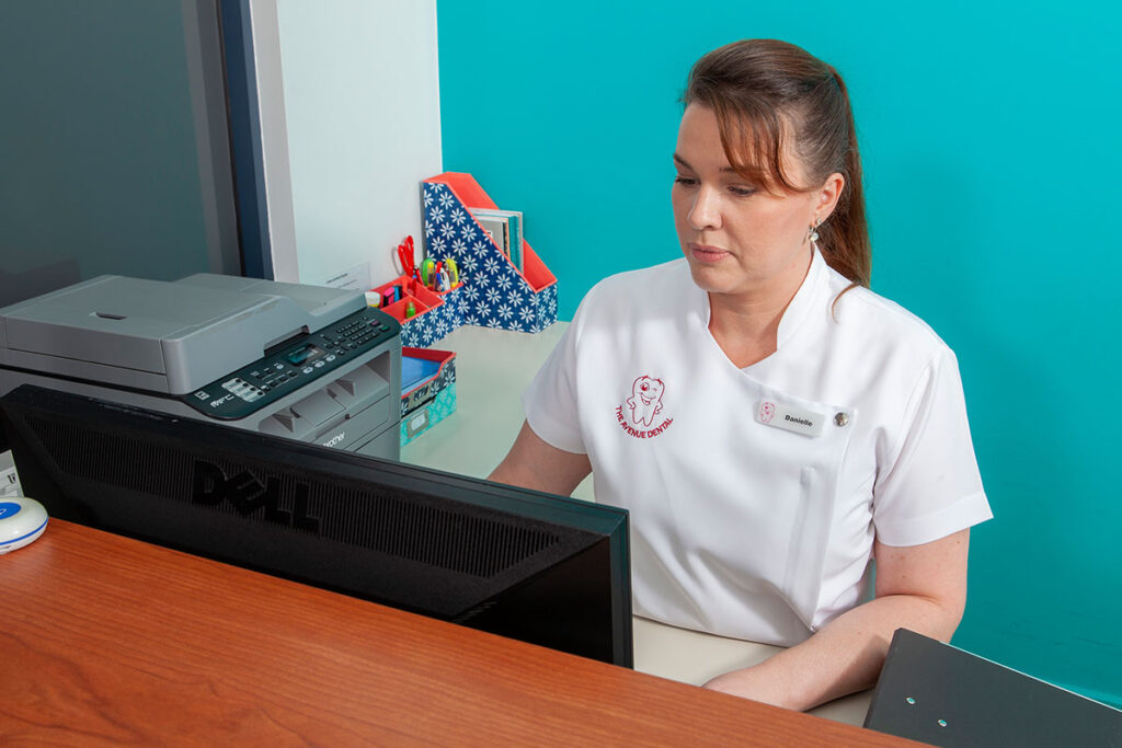 Danielle at front desk of The Avenue Dental Clinic